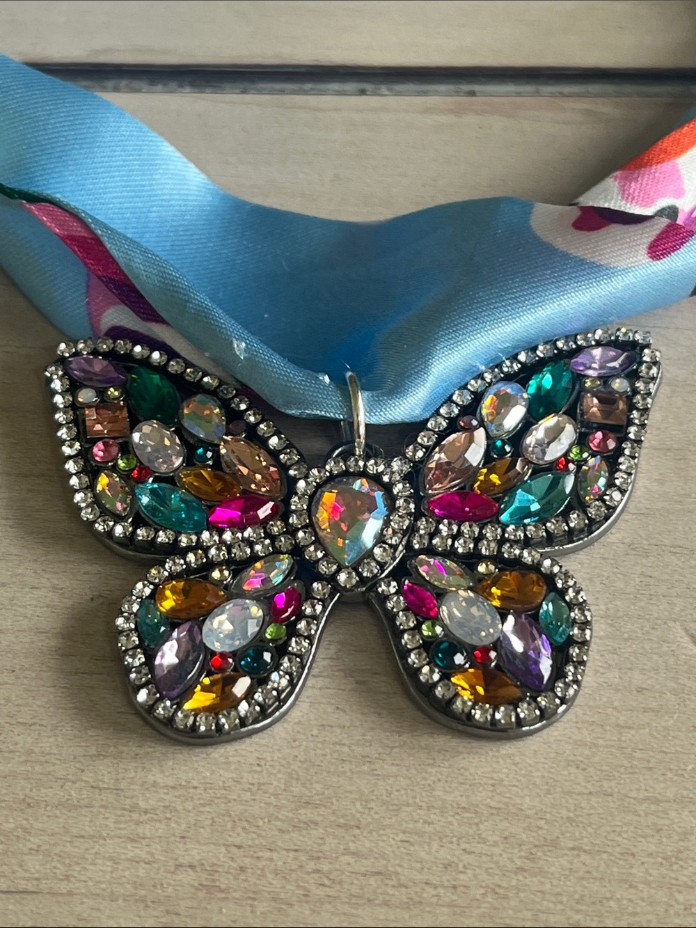 Blue Floral Ribbon Necklace with Jeweled Butterfly Pendant - Picture 2 of 4